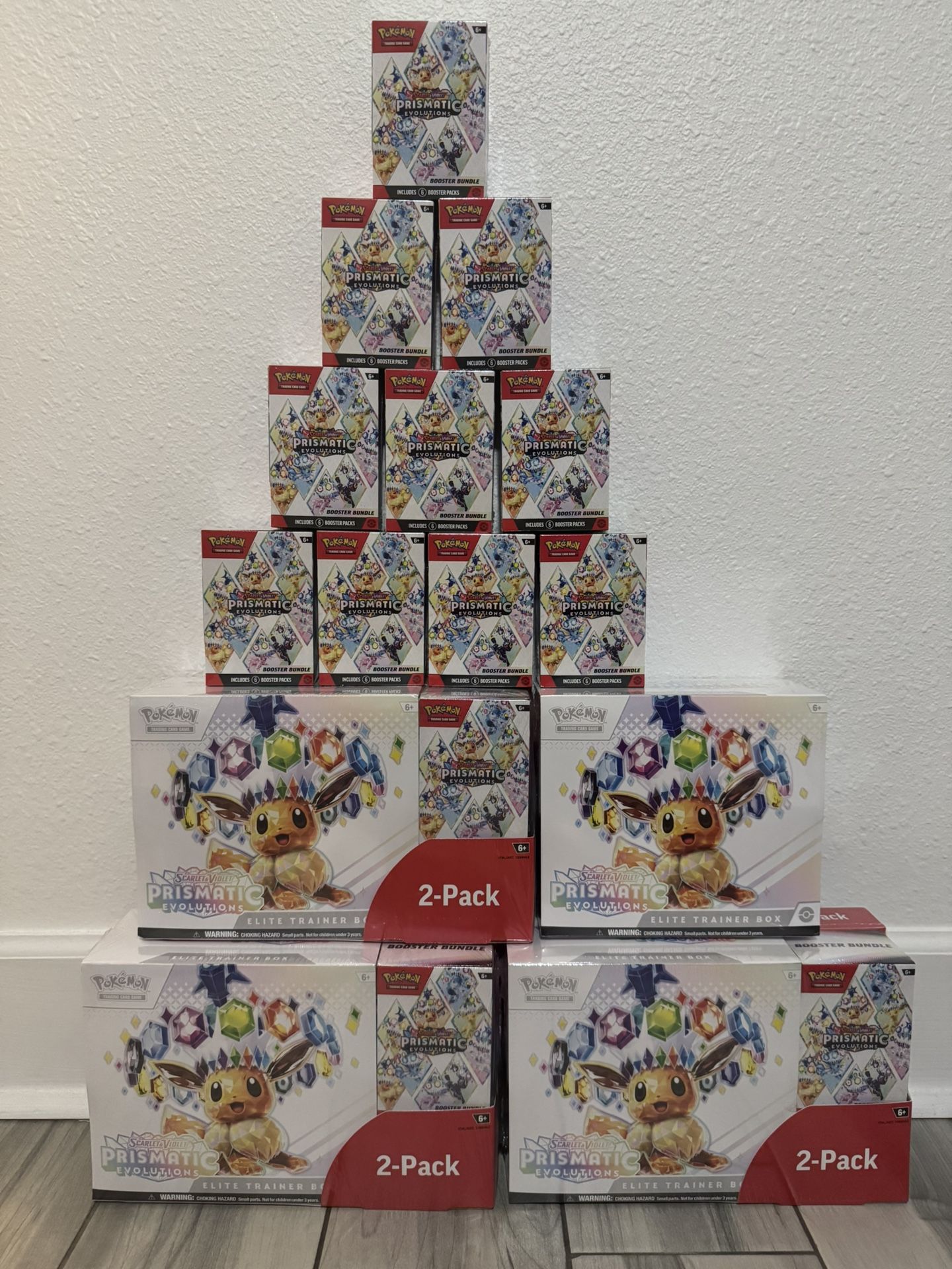 Pokemon Prismatic Evolutions ETB Booster Bundles