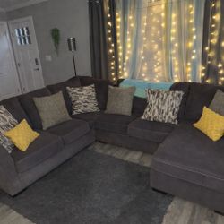 Gray L-shaped sectional sofa with chaise