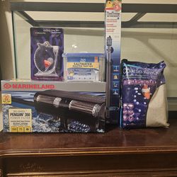55 gallon fish tank with starter supplies.