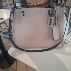 COACH ROGUE 25 $120