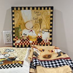 A Kitchen Picture Frame With Two towels, the whole set