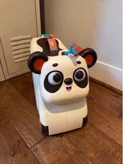 B. toys Ride-On Bingo the Panda Suitcase