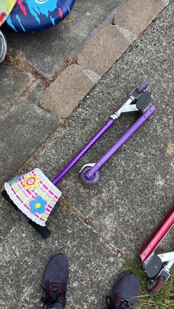 Used purple scooter the flower basket