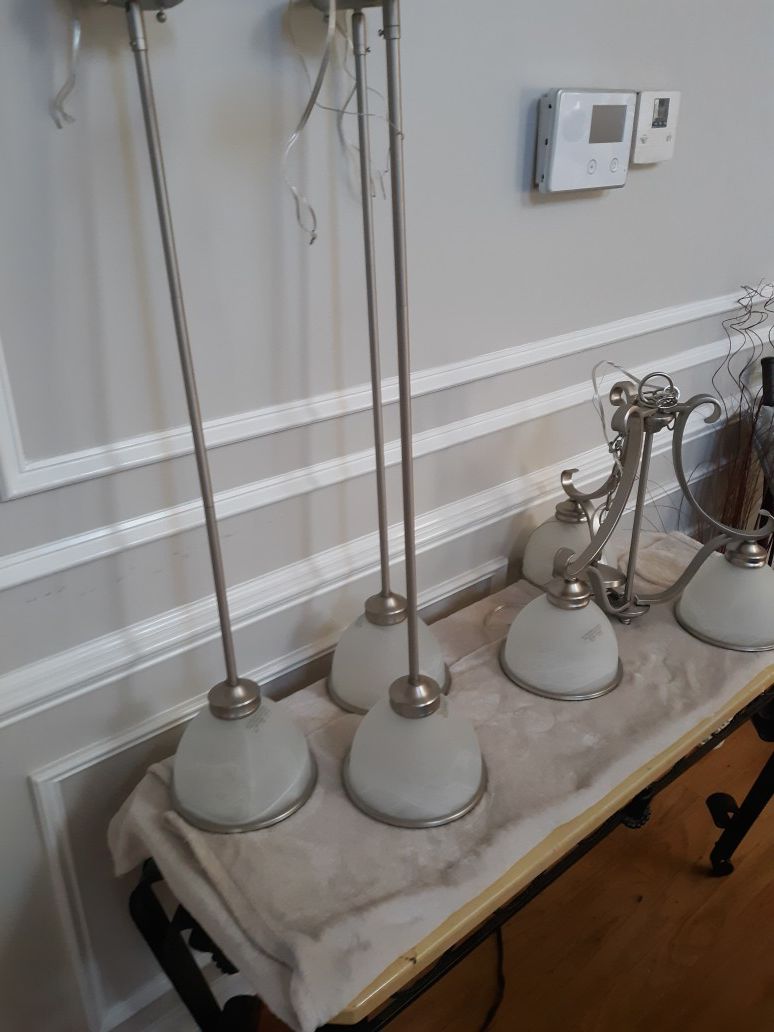 3 pendent lights and 1 chandelier set