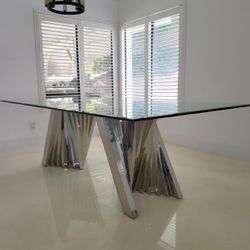 Glass Dining Table With Contemporary Chrome Pedestal Base