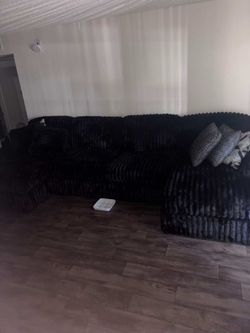 Boneless black ribbed sectional sofa