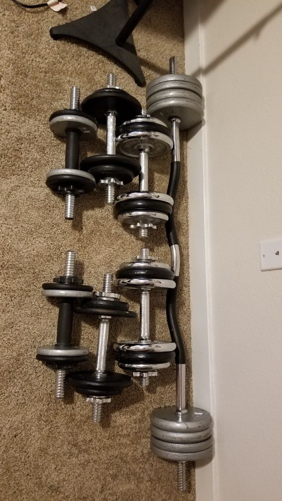 Workout set. Weights, curl bar power press push up station