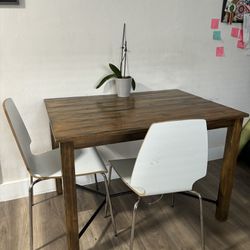 Wood And Metal Table With 4 Ikea White Chairs