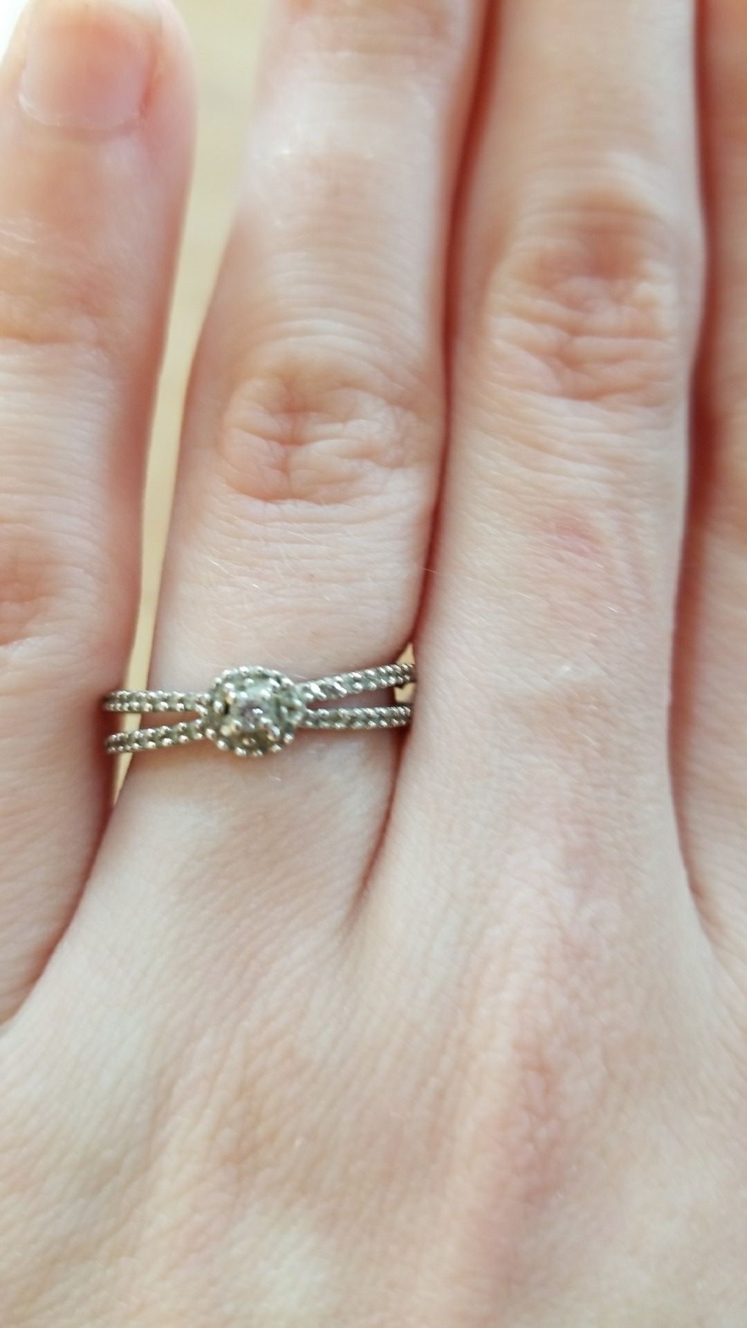 Small diamond and silver promise/engagement ring