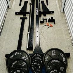 Rogue Squat Stand, Adjustable Bench, Barbell, Plates
