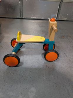 B. toys Smooth Rider Wooden Toddler Bike