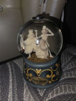 Disney haunted mansion snowglobe