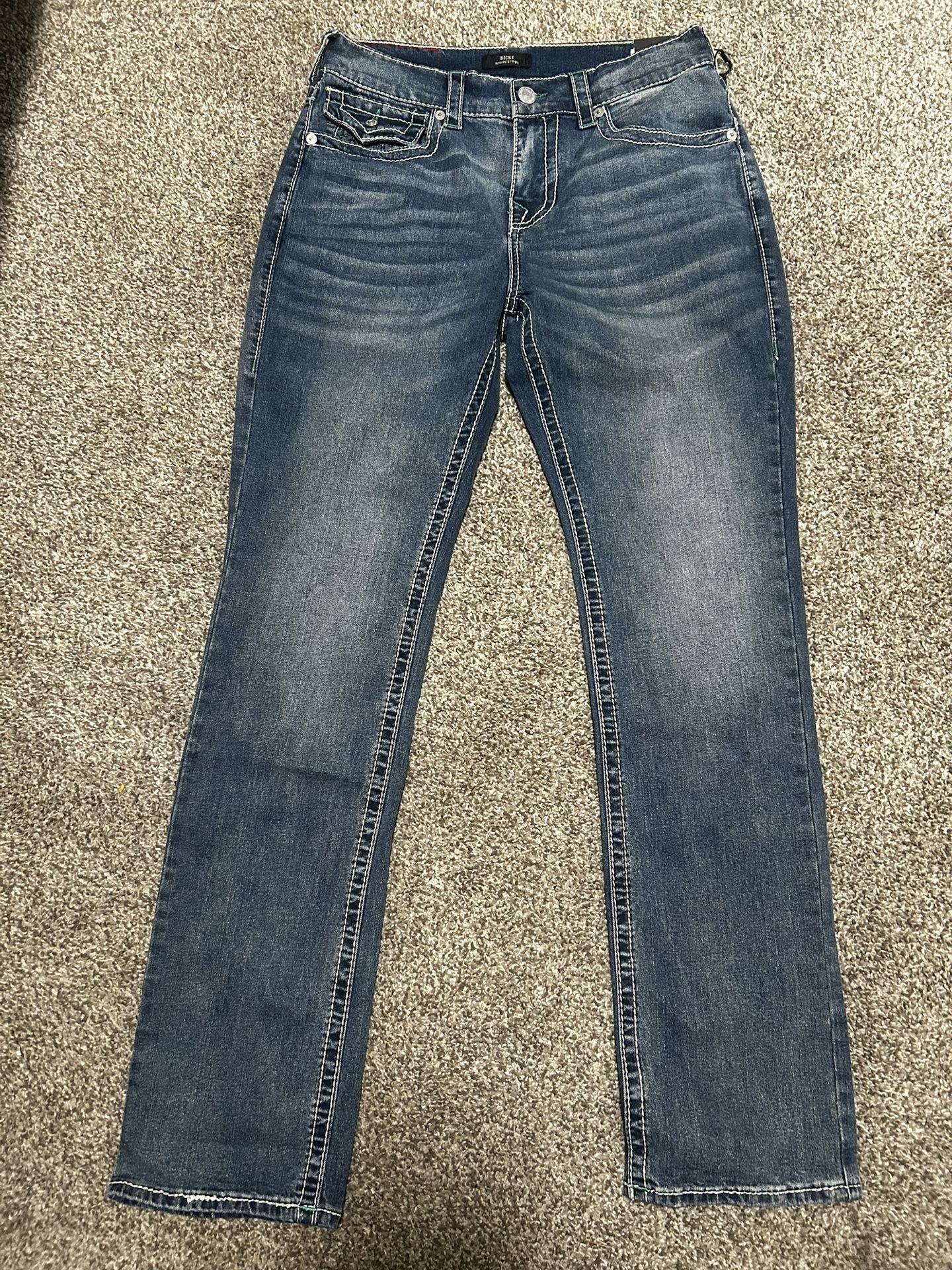 True Religion mid rise, straight or bootcut jeans with flap pockets Size W31 L34