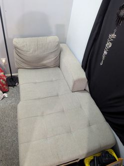 Corner of sectional couch with storage