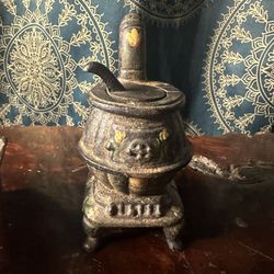 Cast Iron Antique Wood Stove And Wheel Barrow