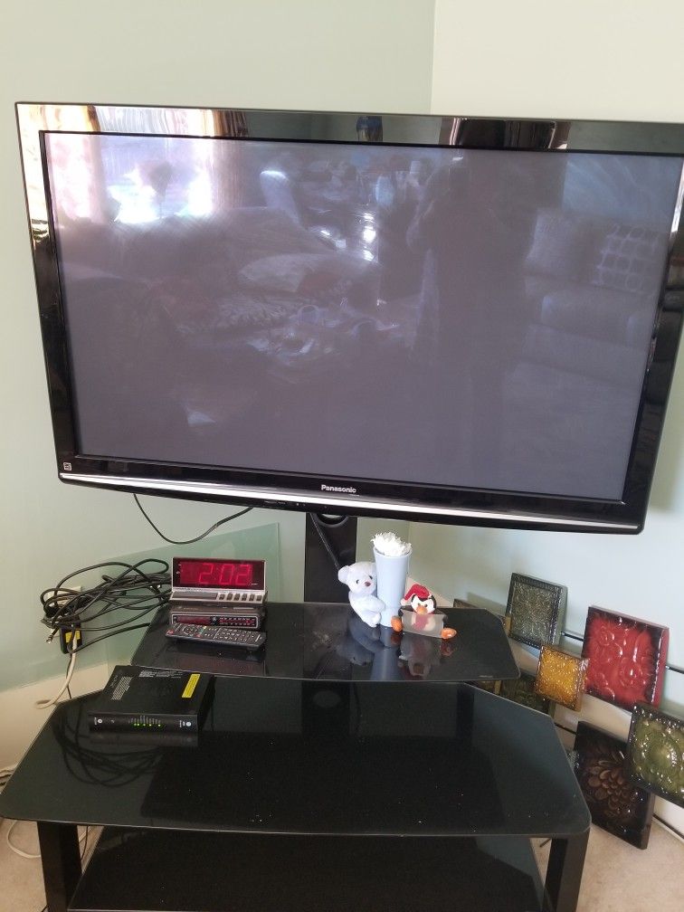 Panasonic TV With Glass Stand