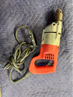 VINTAGE  ￼HEAVY DUTY MILWAUKEE DRILL. $50.00 OR BEST OFFER..
