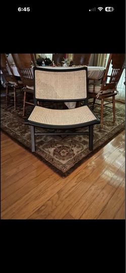 Woven rattan accent chair with teakwood frame