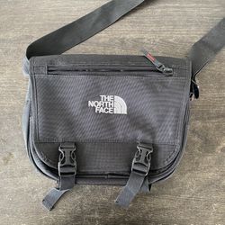 The North Face black messenger bag