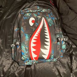 spray ground backpack
