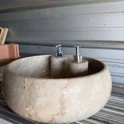 Marble bathroom vanity with shampoo bottle included