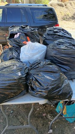 9 blk bags of clothes 4 bags of shoes