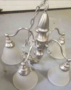 Chandelier with frosted glass shades