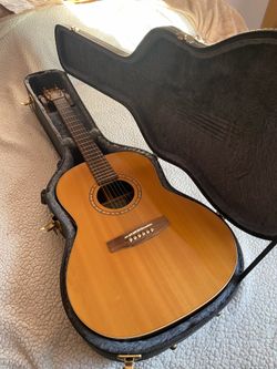 Simon’s and Patrick pro folk guitar