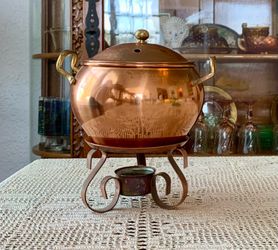 Vintage copper potpourri simmering, tea light warming pot