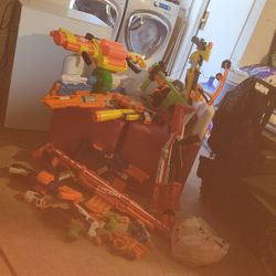 Lot Of Nerf Guns Some Ammo Included And With Vest