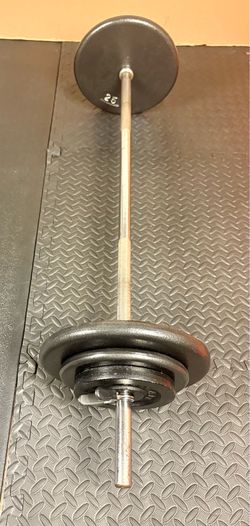 48 inches Steel Standard Barbell W/Weight Plates: 25s, 10s and 5s ponders. 93 # Brute W.