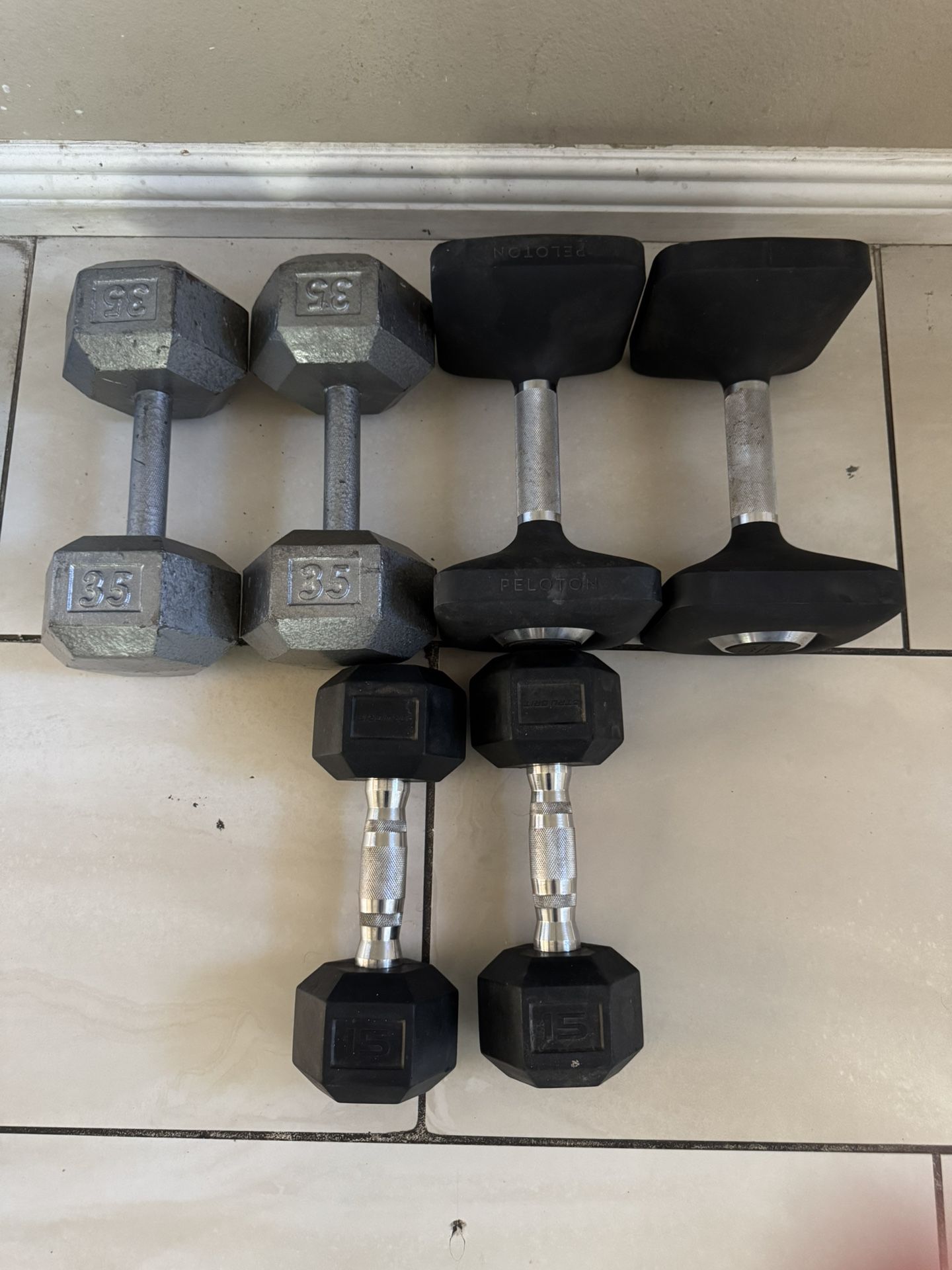 Pairs of 35,30,15 dumbbells weights