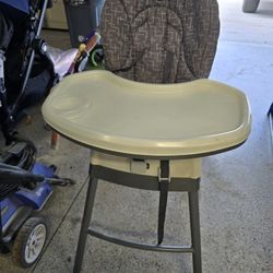 2 kids high chairs and a dog cage 