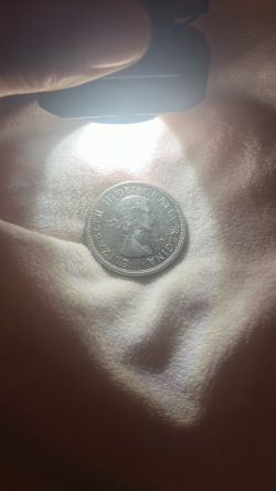 1/3 of an inch Dollar Coin /1(contact info removed) Silver 1/3 of an inch in diameter