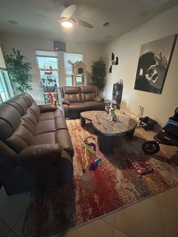 Brand new reclining living room set