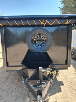 NEW 2027 DUMP TRAILERS. WE SELL , FINANCE , & RENT