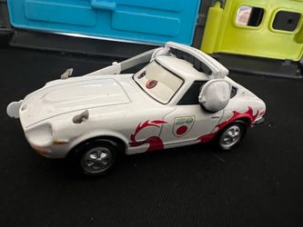 DISNEY PIXAR CARS DIECAST  MACH MATSUO TODOROKI - DIECAST WHITE CAR WITH HEADSET
