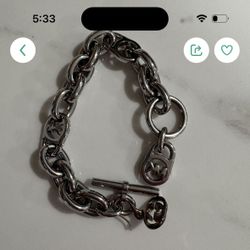 Michael Kors silver tone bracelet. 