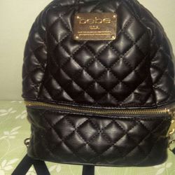 used Bebe small leather backpack
