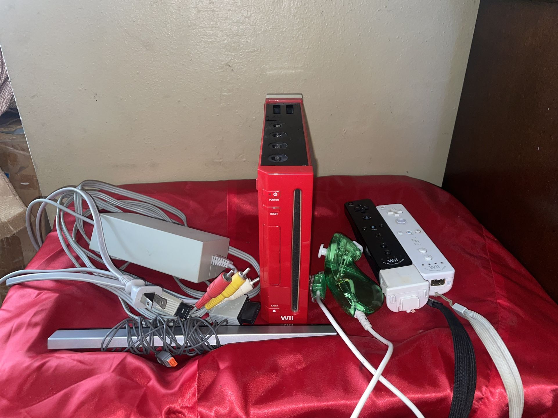 Red Nintendo Wii With 3 Controllers 