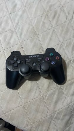 black Sony PlayStation 3 DualShock 3 wireless controller
