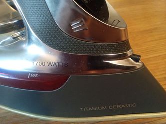 Chi (super iron), italics mine, 1700 watt titanium ceramic, do it all