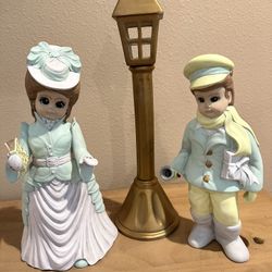 Hand Painted Carolers And Light post
