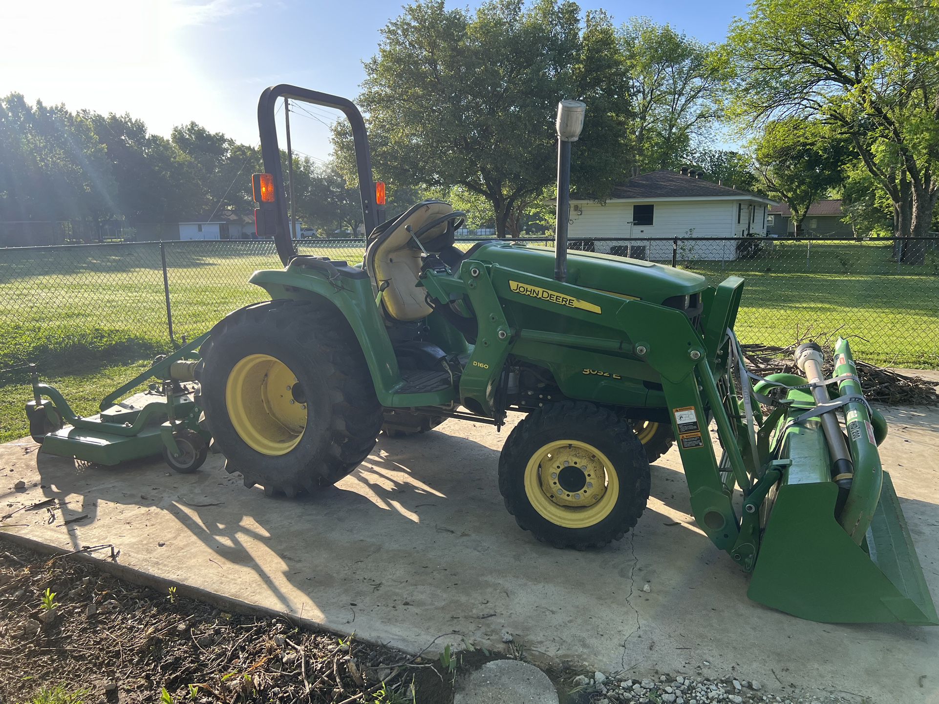 2014 John Deere 3032e tractor with front loader, grooming mower and post hole digger