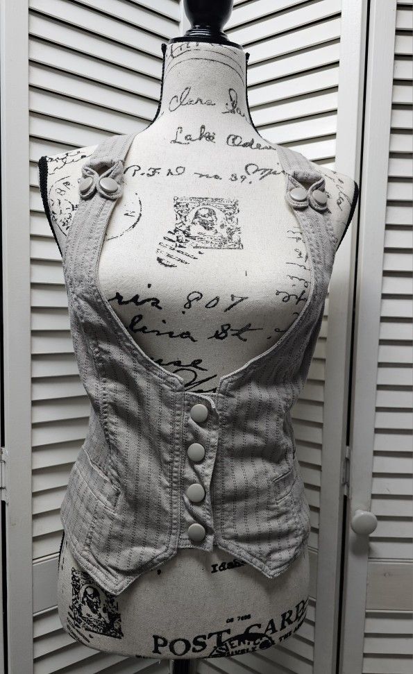 Cute vintage button-up vest with a modern take in grey with black stitching