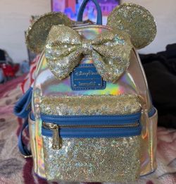 Never used Disney loungfly free with purchase only