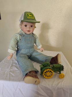 Johnny porcelain collectible doll from the John Deere collection,