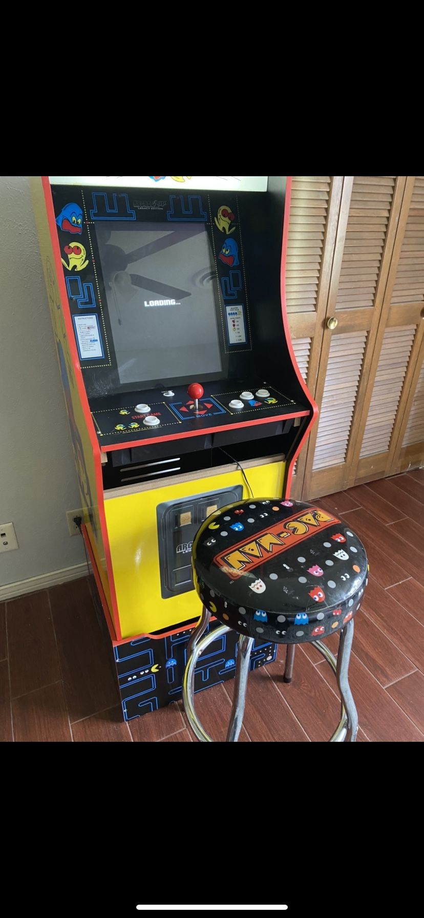 Pac-Man Arcade Game With The Stool