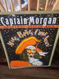Tin captain Morgan sign