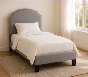 Gray Upholstered Twin Bed Frame with Nailhead Trim